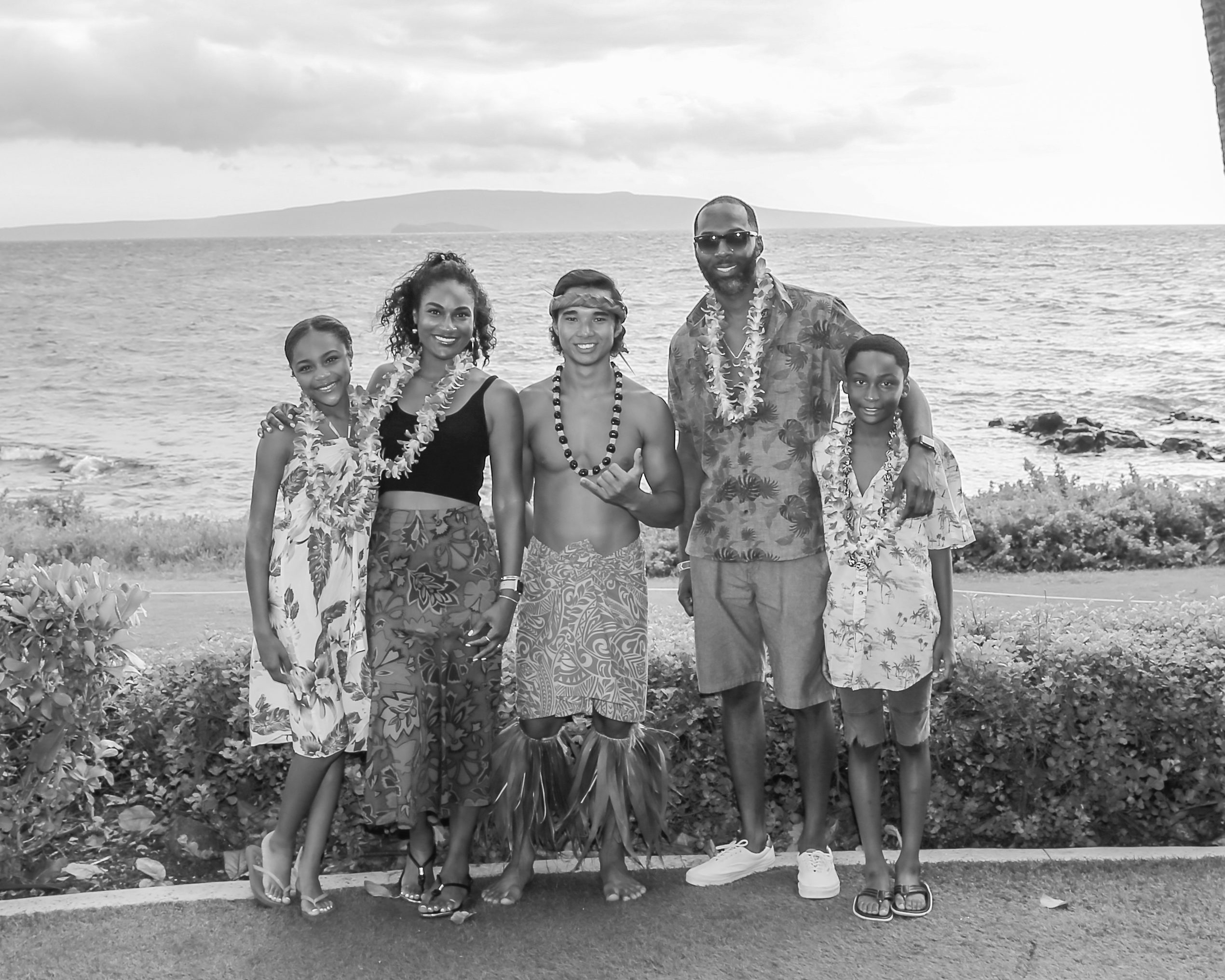 Beautiful Black family on the beach on Maui at a Luau